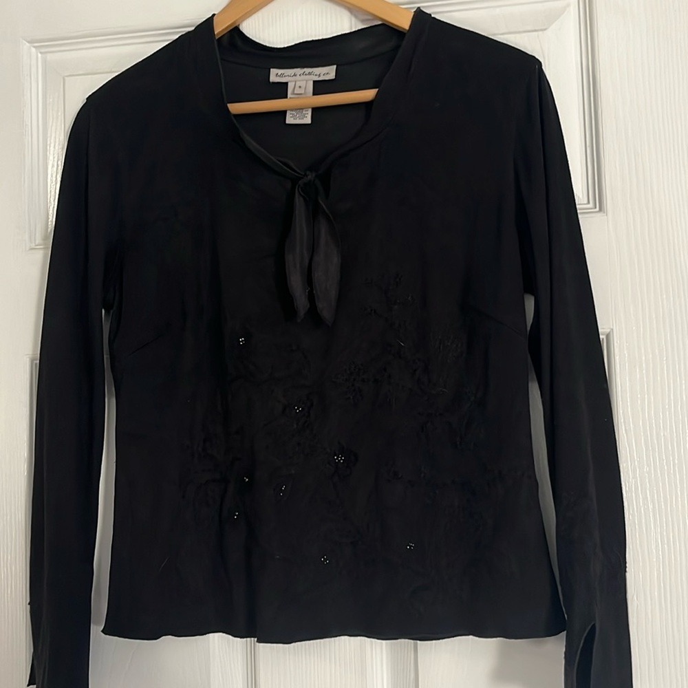 Black suede like material top with beaded accent